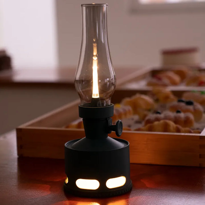 Close-up of the LED filament inside the LumaLantern vintage lantern, mimicking traditional bulb glow