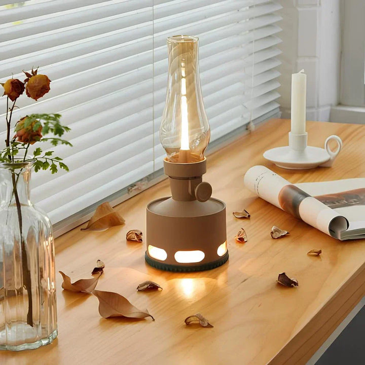 Portable LumaLantern rechargeable LED lantern being carried outdoors, ideal for camping and ambiance