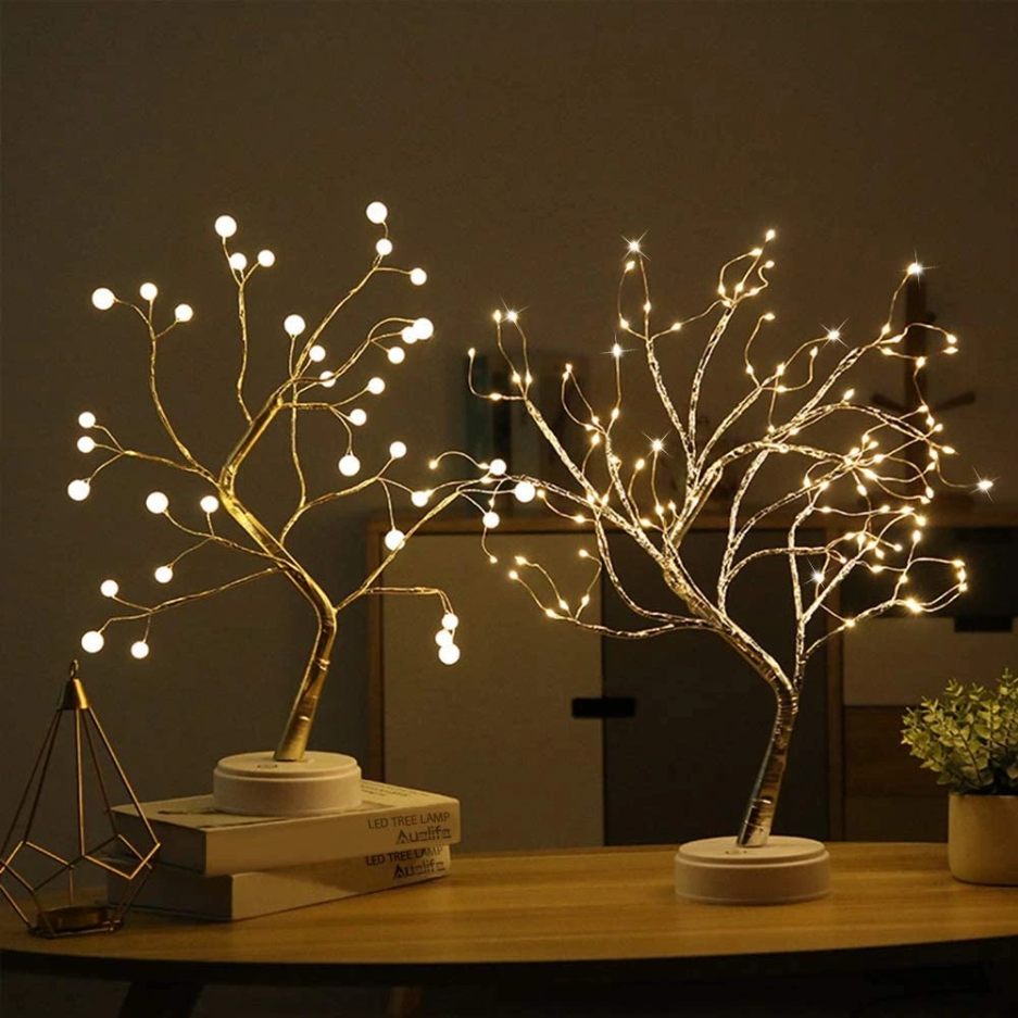 LumaTree enchanted LED tree lamp with warm glowing fairy lights, perfect for creating an atmospheric night light in your home.