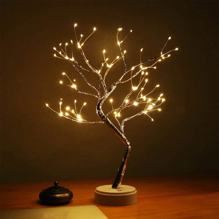 LumaTree LED tree lamp with sparkling fairy lights, designed to provide cozy, atmospheric lighting and act as a decorative table lamp.