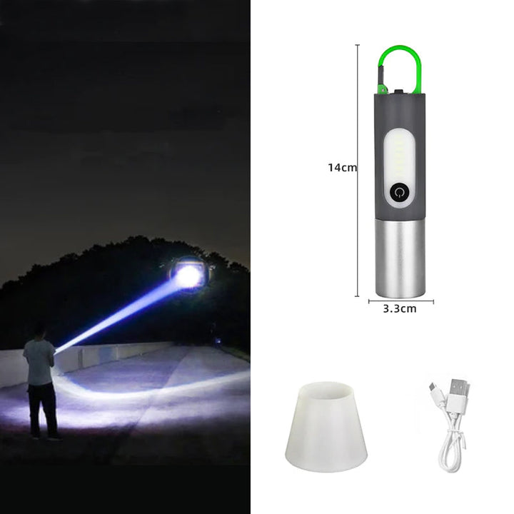 Close-up of LumaZoom zoomable LED flashlight, showcasing its durable design for outdoor use.