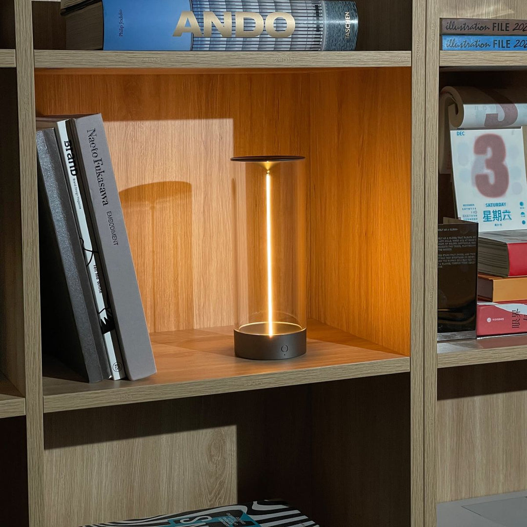 LumenFlow rechargeable modern lighting, held in hand to show its compact and portable design