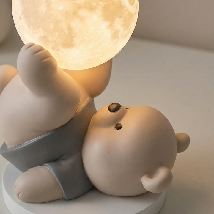 Close-up of LumiBearo bear bedside lamp, showcasing touch control feature and warm LED glow