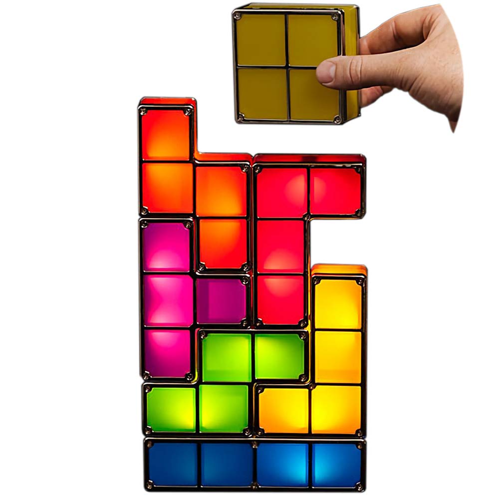 Creative lighting setup with multiple LumiBlocks Tetris lamps arranged in a unique pattern, enhancing home decor