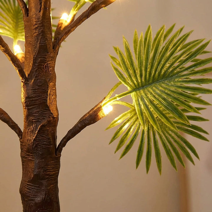 Unisex tropical palm tree LED table lamp, a stylish accent for any room's decor.