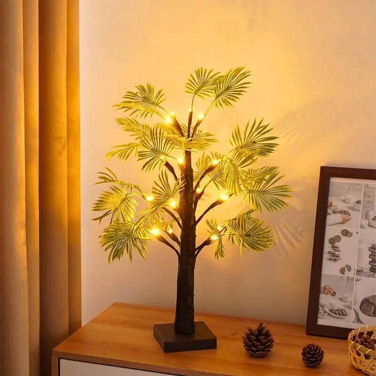 Close-up of LuminaraPalm LED night lamp, showcasing its detailed palm tree design and soft light.