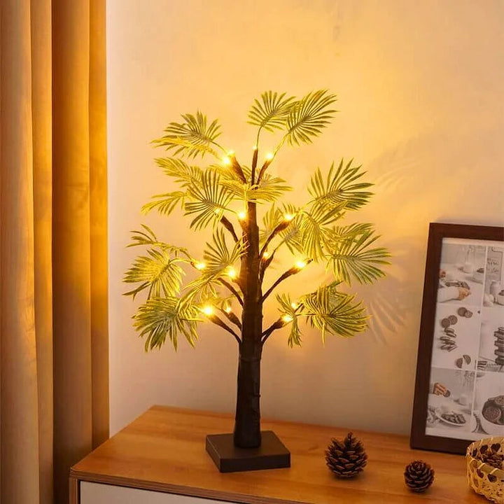 Close-up of LuminaraPalm LED night lamp, showcasing its detailed palm tree design and soft light.