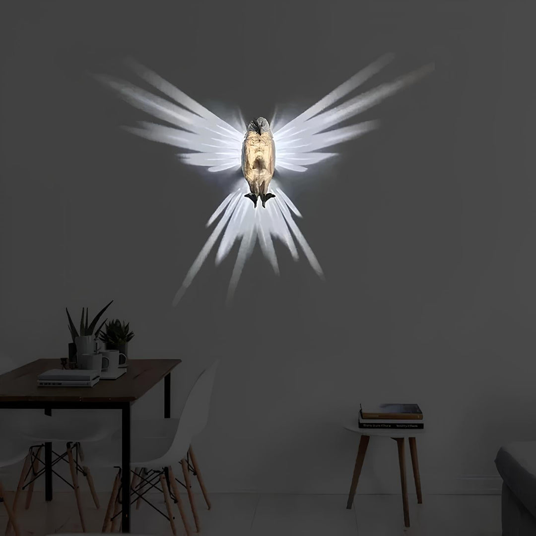 Close-up of LumaWings LED wall lamp, white resin wings with soft light, nature-inspired home decor.