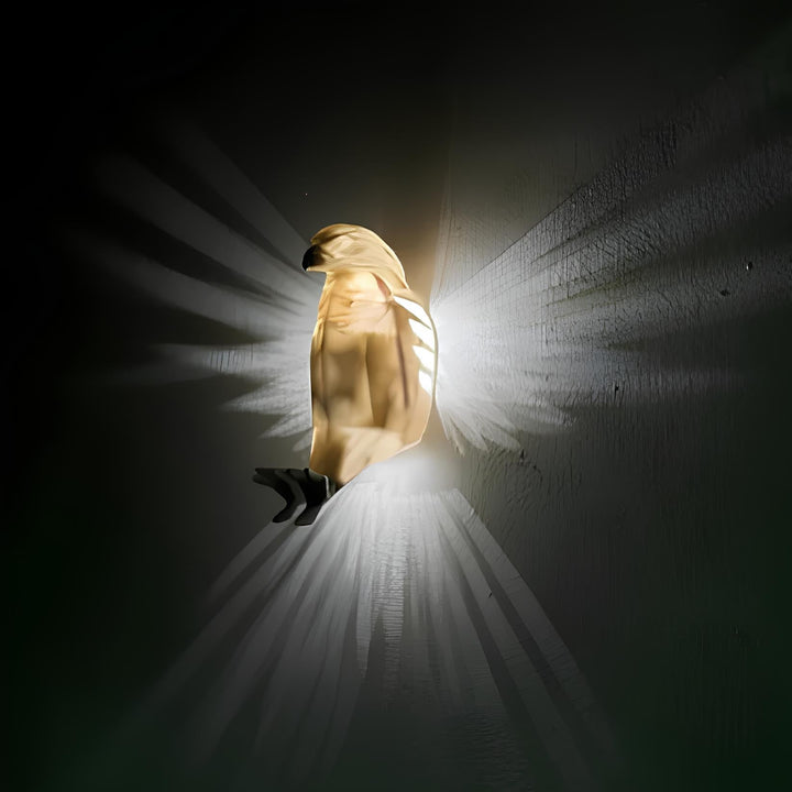 Detail of the translucent resin wings of the LumaWings wall lamp, showcasing light diffusion.