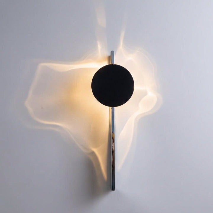 Sculptural Luminova wall sconce, an abstract decorative LED lamp providing ambient light