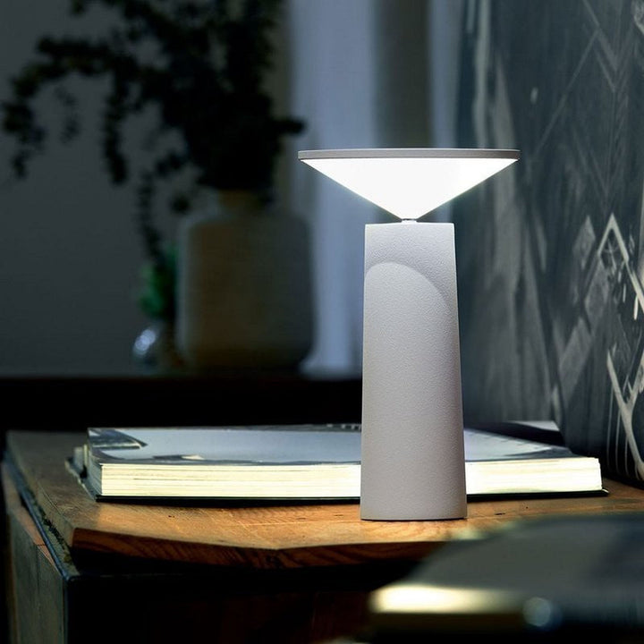 Contemporary LumoFlex wireless lamp, providing dimmable LED light and modern home decor flexibility.