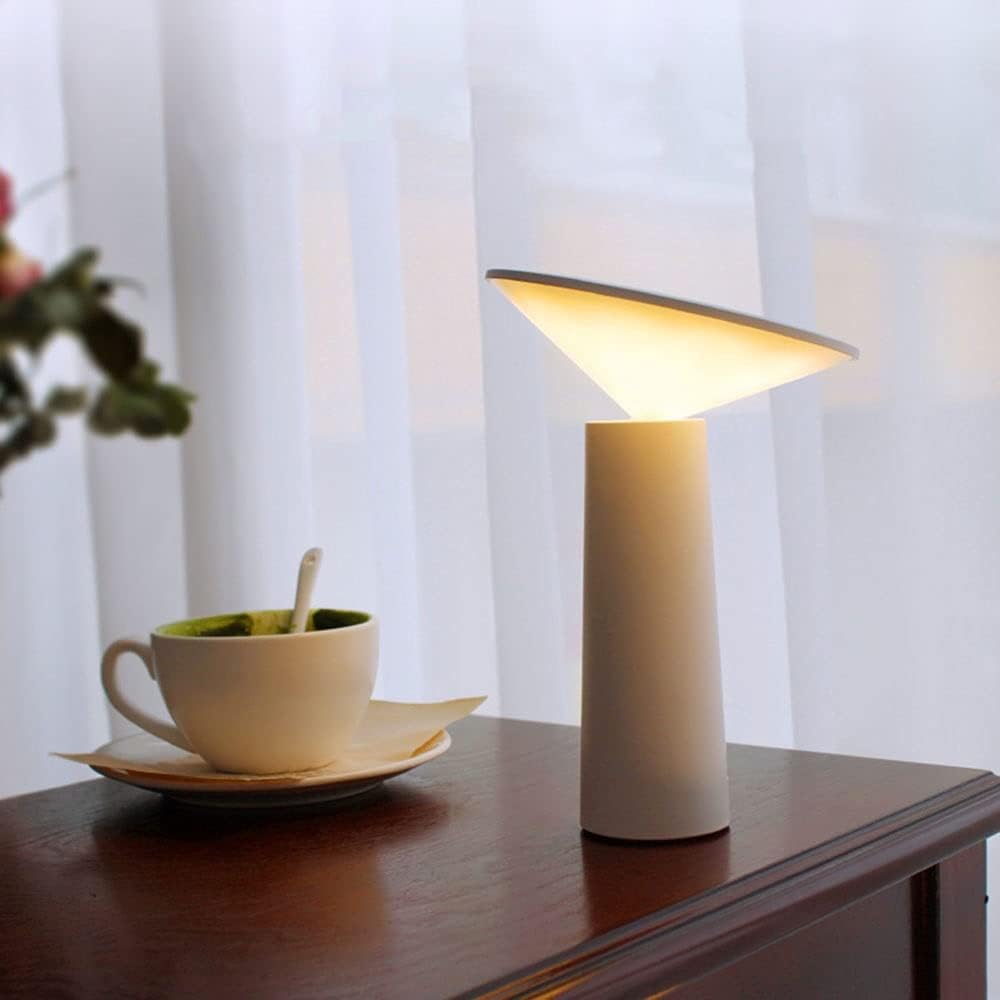 Rechargeable LumoFlex LED table lamp, a versatile and portable lighting solution for any modern space.
