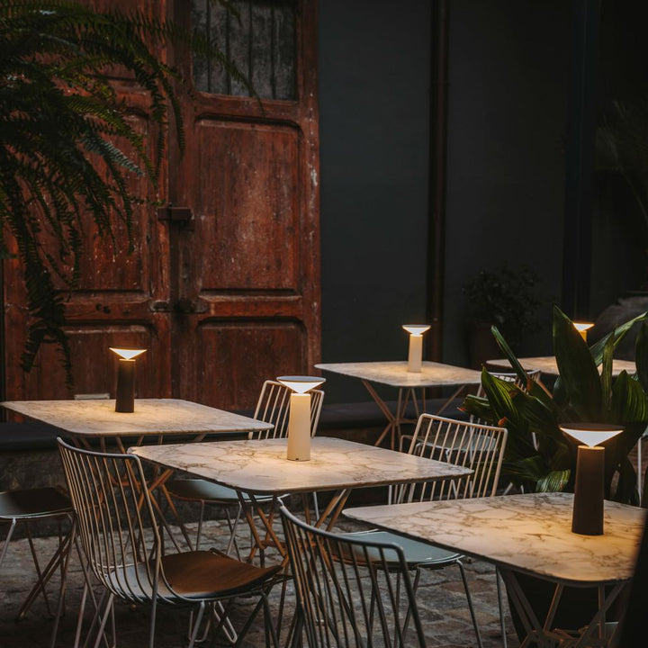 Wireless LumoFlex portable lamp, offering adaptable dimmable light for contemporary home decor needs.