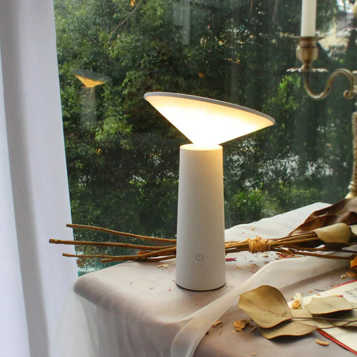 Stylish LumoFlex LED table lamp, designed for portability and dimmable lighting in modern settings.