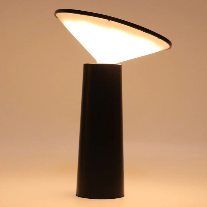 LumoFlex flexible table lamp, a rechargeable and dimmable LED light for diverse modern spaces.
