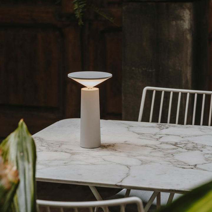 Sleek LumoFlex wireless table lamp, providing customizable dimmable light for a modern aesthetic.