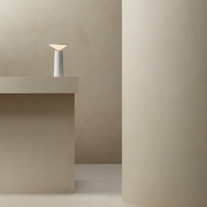 Modern home decor with a LumoFlex portable dimmable LED table lamp, enhancing ambiance.