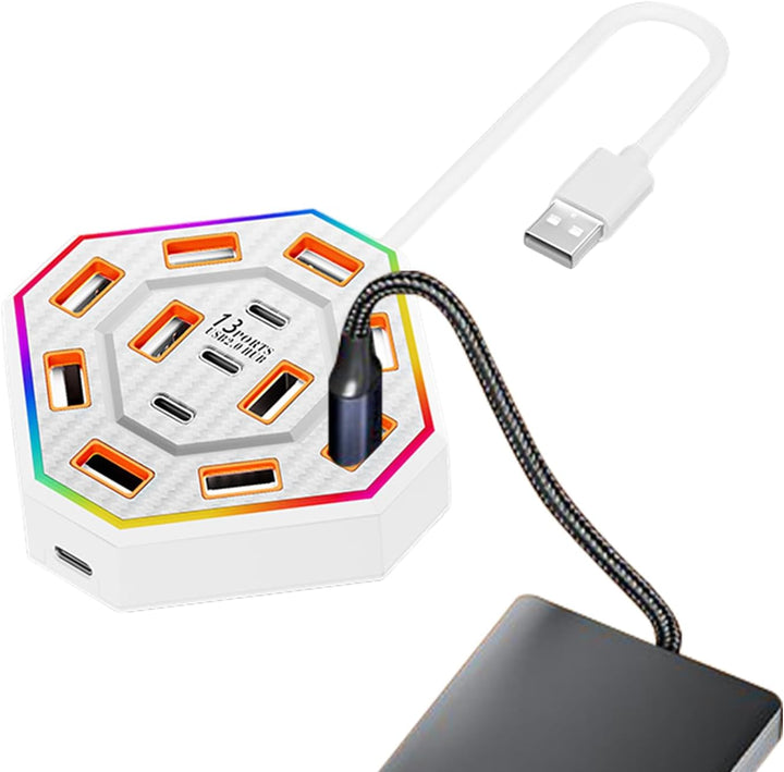Lumora docking station in a home office setting, showcasing its compact design and ambient RGB glow.