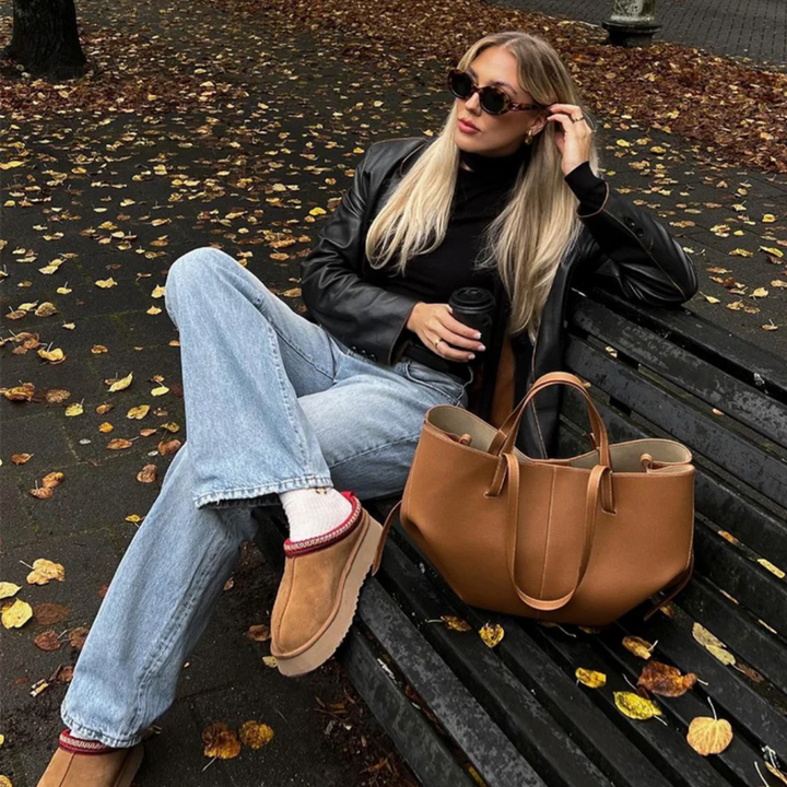 Elegant women's leather handbag, a versatile daily fashion accessory and luxury shoulder bag.