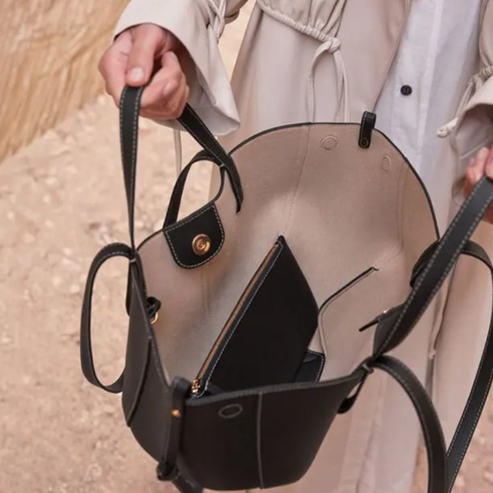 Women's daily leather shoulder bag, practical yet luxurious accessory for elegant everyday style.