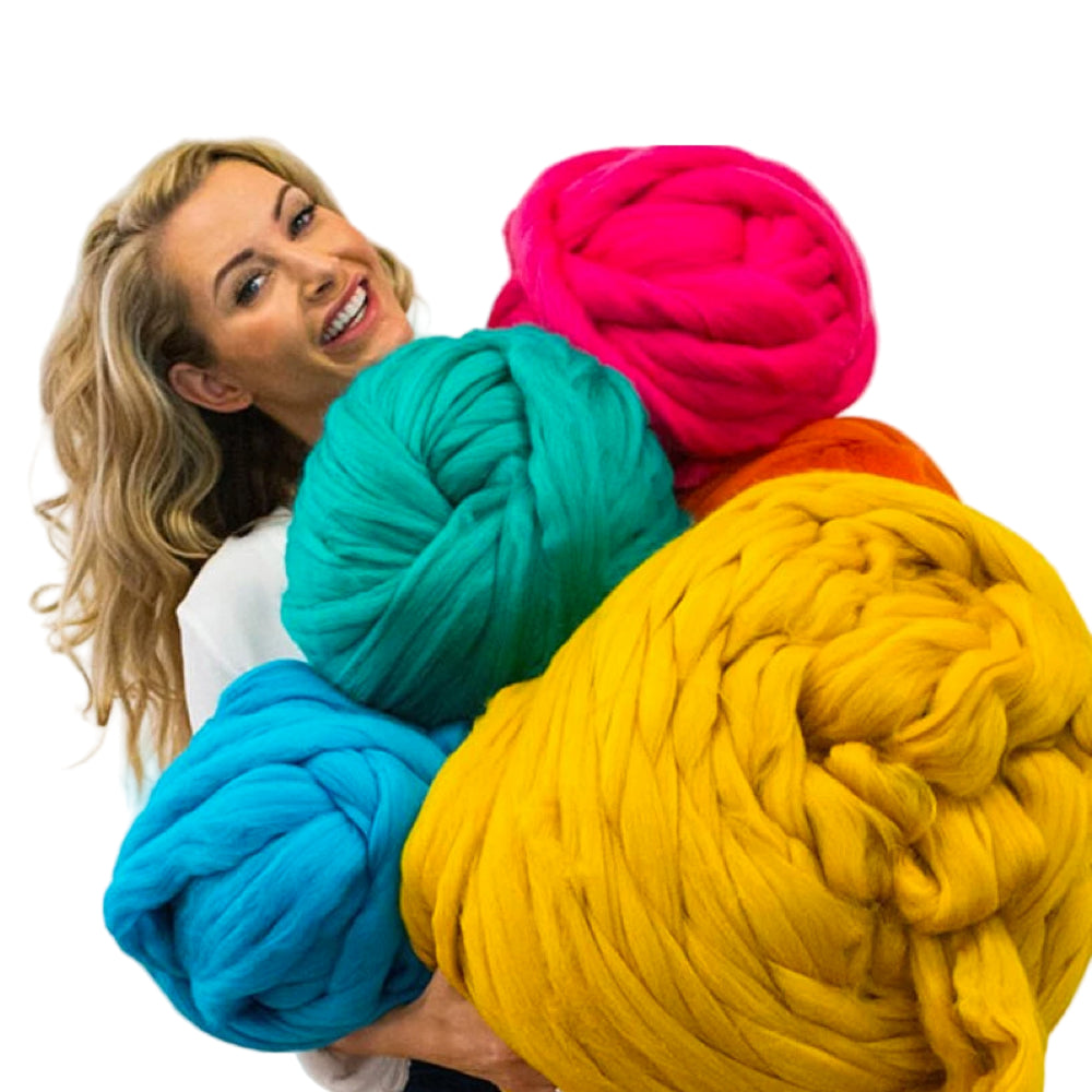 Luxurious chunky wool yarn in natural beige, perfect for knitting cozy blankets and apparel.