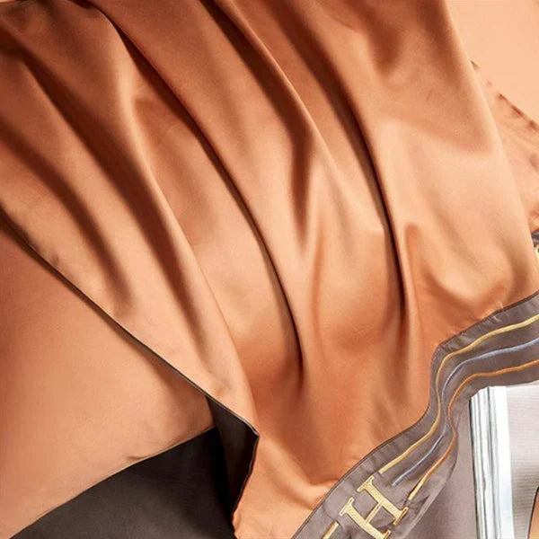 Upgrade your bedroom decor with this luxurious embroidered satin cotton bedding set.