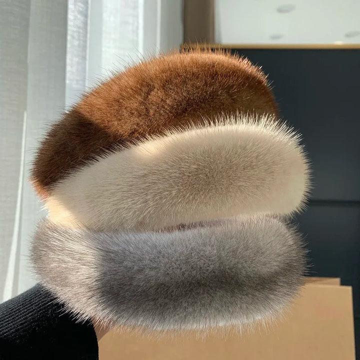 Elegant women's faux fur headband, fashionable winter accessory, perfect for cold weather style.