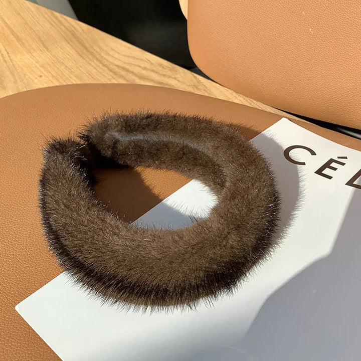 Stylish women's faux fur headband, elegant fashion accessory, warm for winter and cold weather.