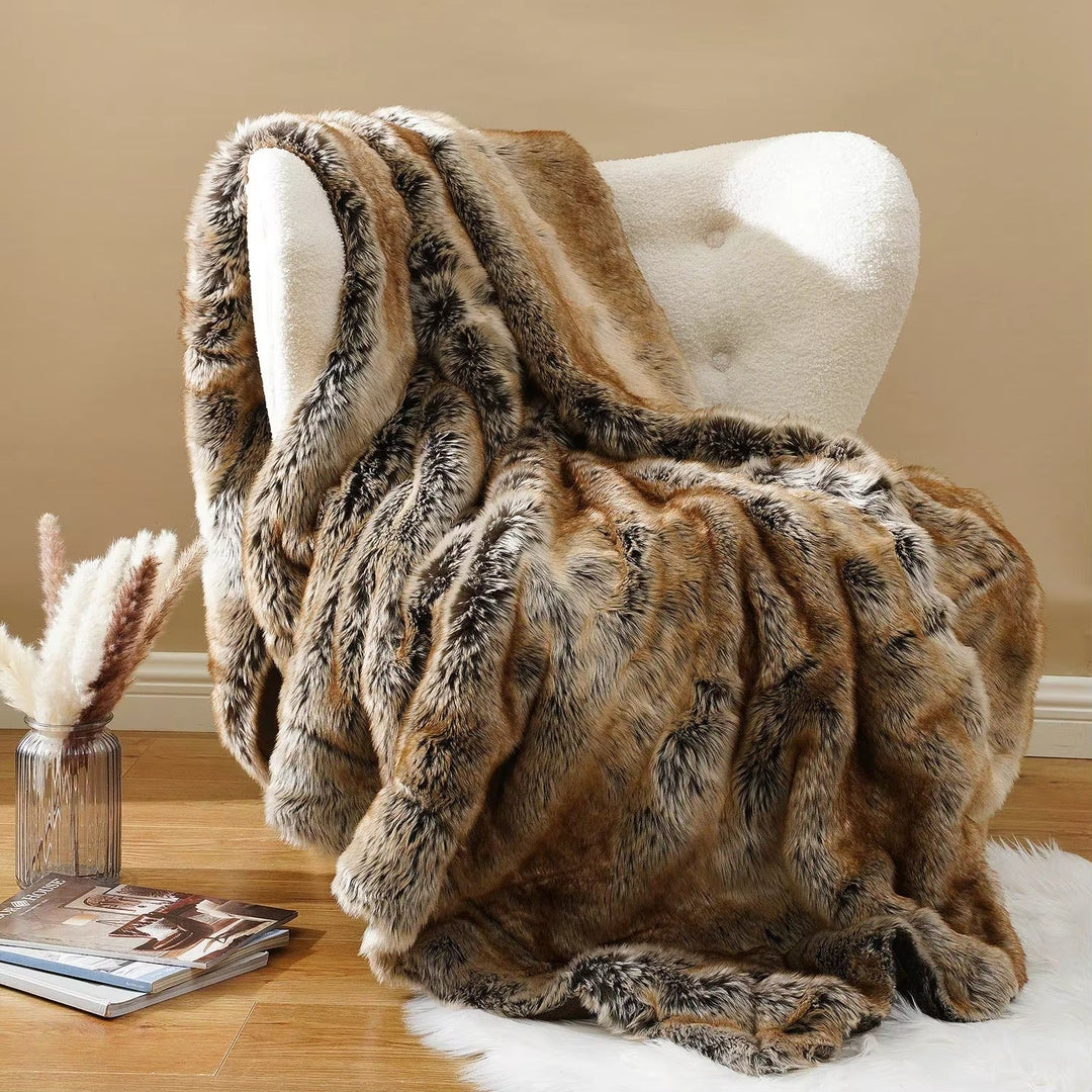 Luxurious faux fur throw blanket, a cozy home decor accent for warmth & style, perfect for any room.