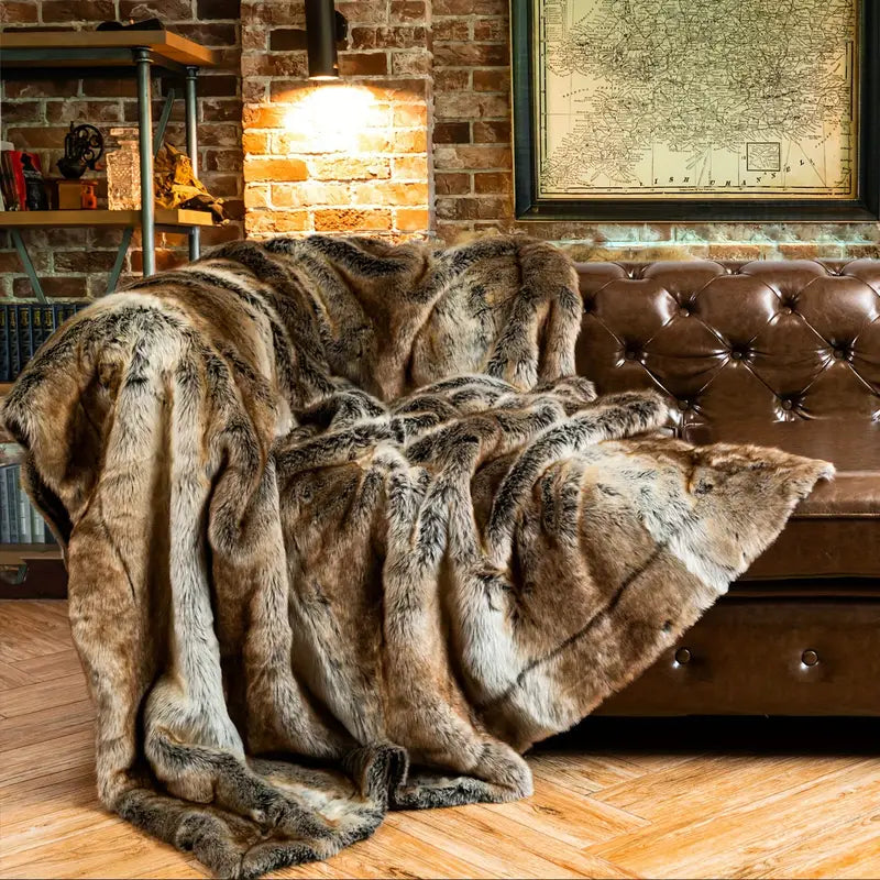 Soft & cozy faux fur throw blanket, providing ultimate comfort and a luxurious feel for home decor.