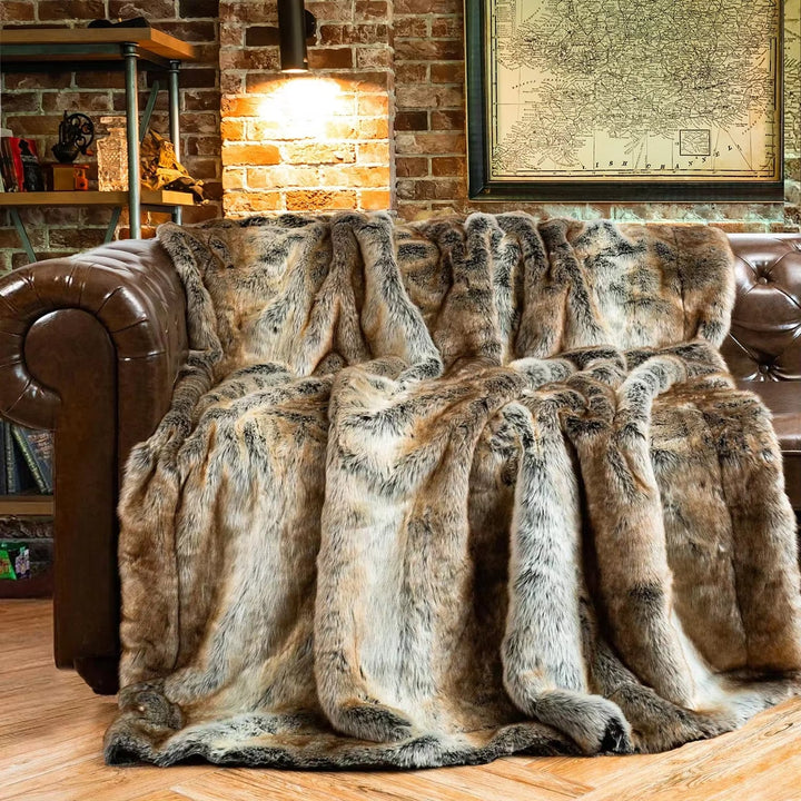 Elegant faux fur throw blanket, a decorative accent adding luxury and warmth to your home decor.