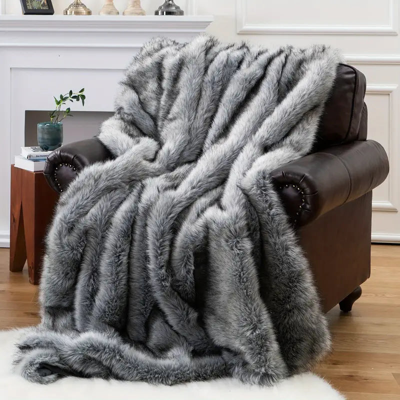 Luxury faux fur throw blanket, super soft, warm, and a stylish decorative accent for cozy home decor.