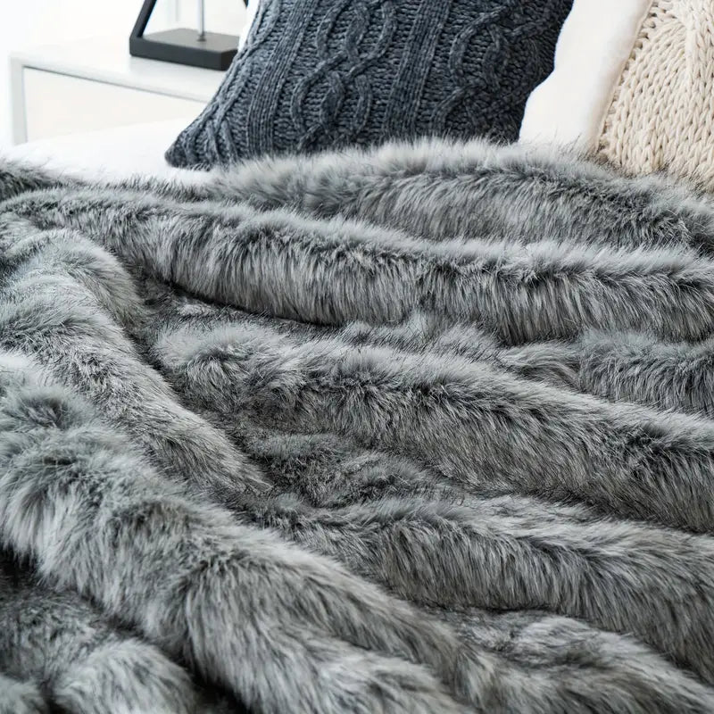 Versatile faux fur throw blanket, a cozy, warm & soft blanket ideal for adding luxury to home decor.