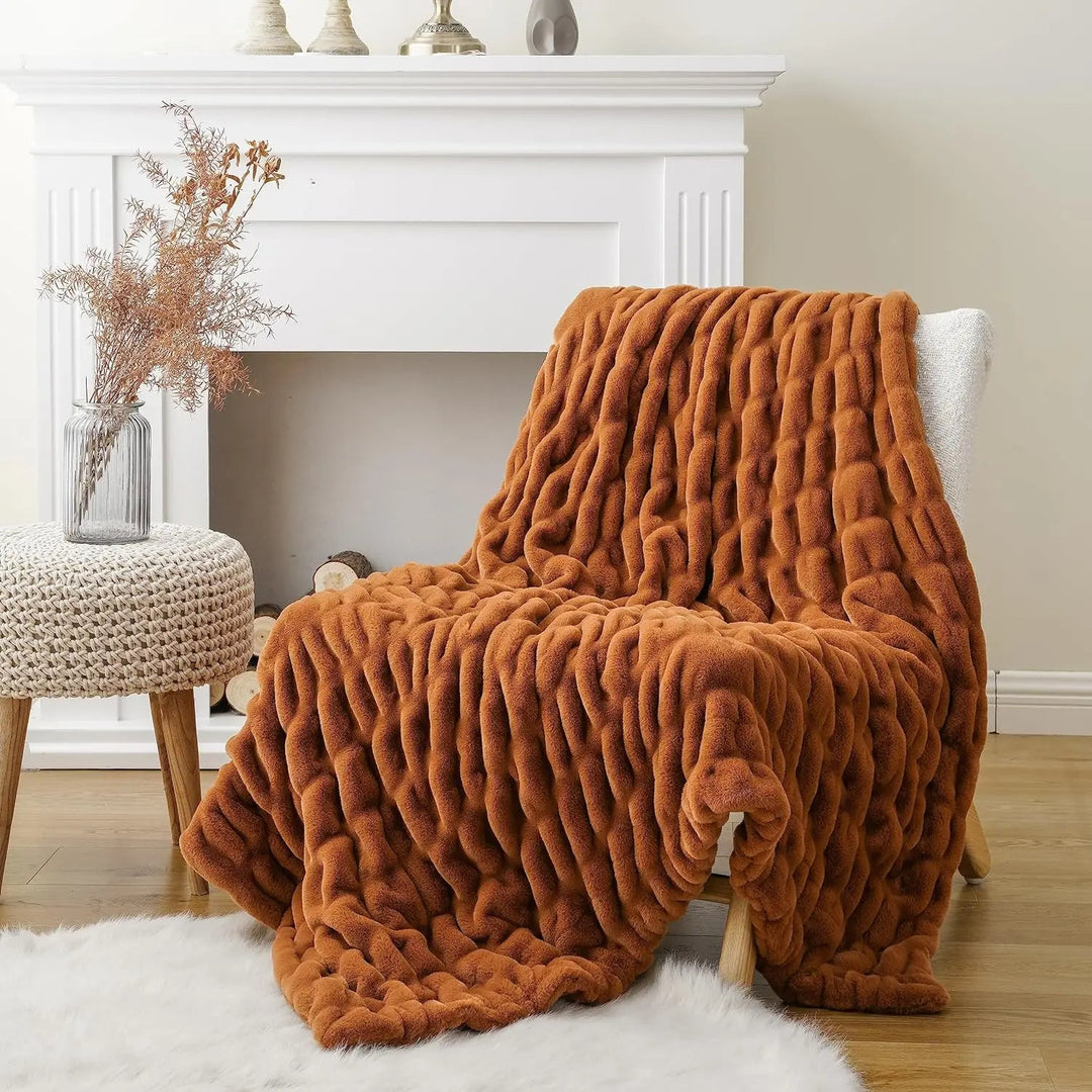 Ultra-soft faux fur throw, designed for ultimate comfort and stylish home decor.