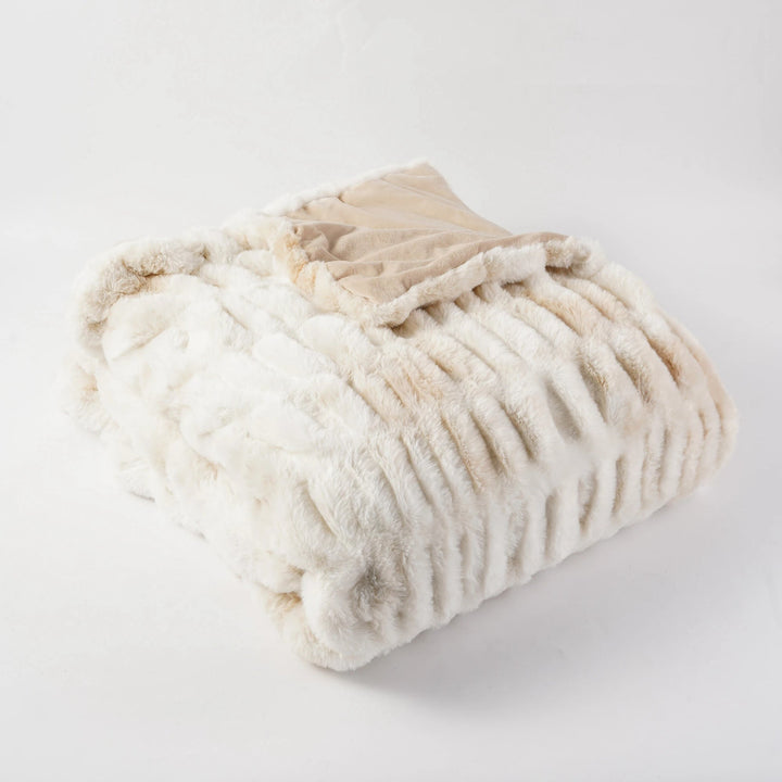 Cozy and luxurious faux fur throw blanket for ultimate home comfort and style.