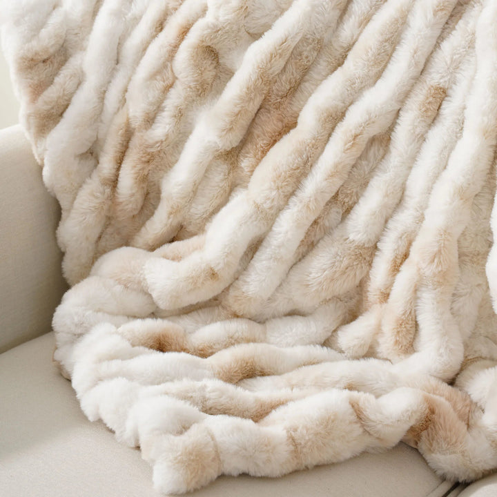 Comforting faux fur throw blanket, super soft for cozy moments in your home.