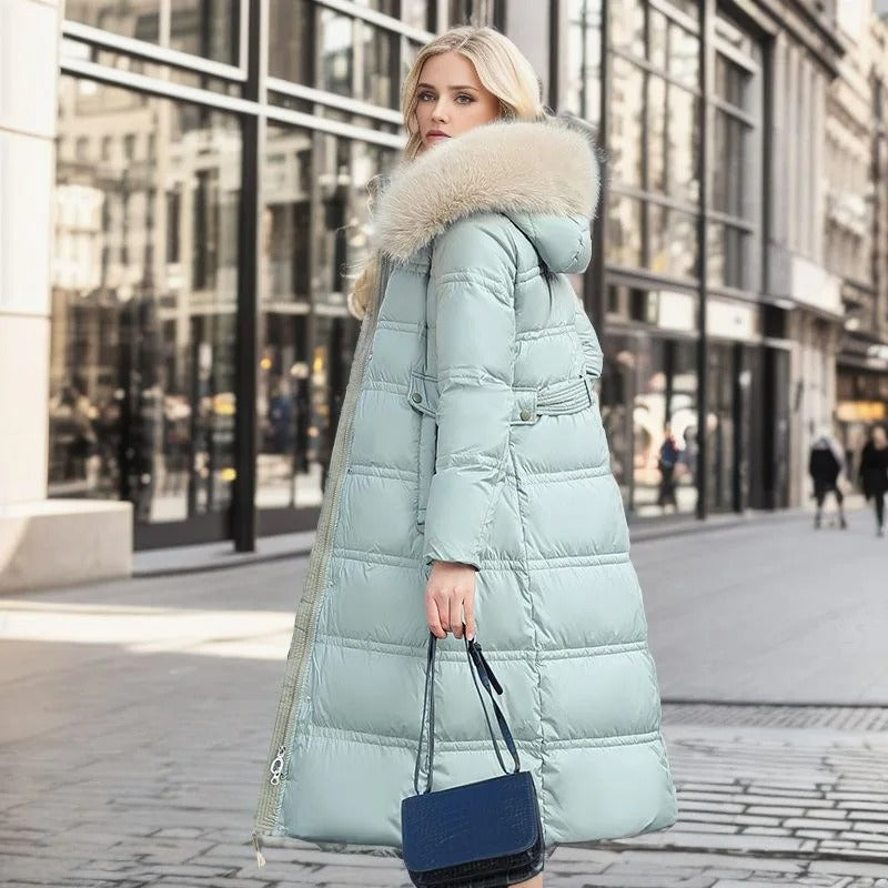 Women's sophisticated faux fur winter coat, a chic cold weather wardrobe essential.