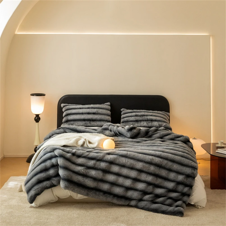 Super soft faux rabbit fur blanket, a warm and stylish decorative throw for luxury home decor.