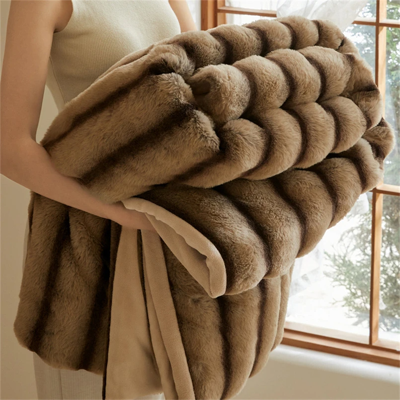 Elegant faux fur throw blanket, a cozy and decorative accent for your bed or sofa. Rabbit fur feel.