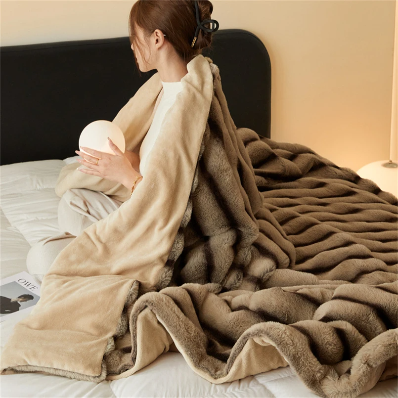 Cozy faux rabbit fur throw, designed for supreme softness and warmth. Great for bedroom essential.