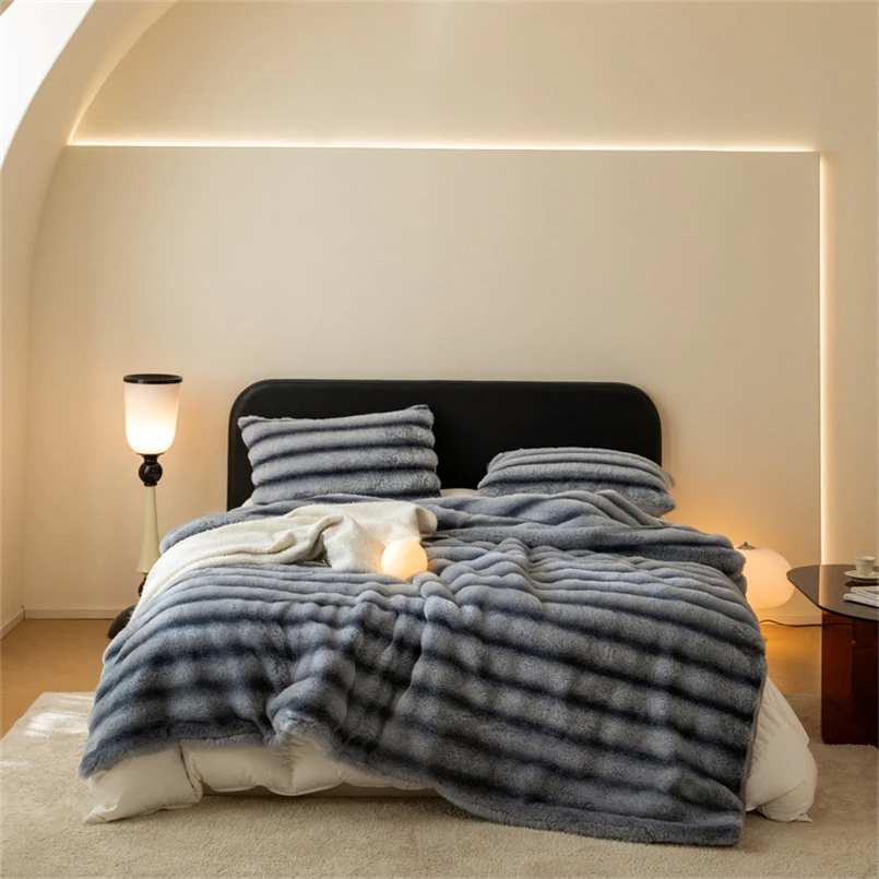Premium faux rabbit fur throw blanket, incredibly soft and comfortable. Perfect for a cozy living space.