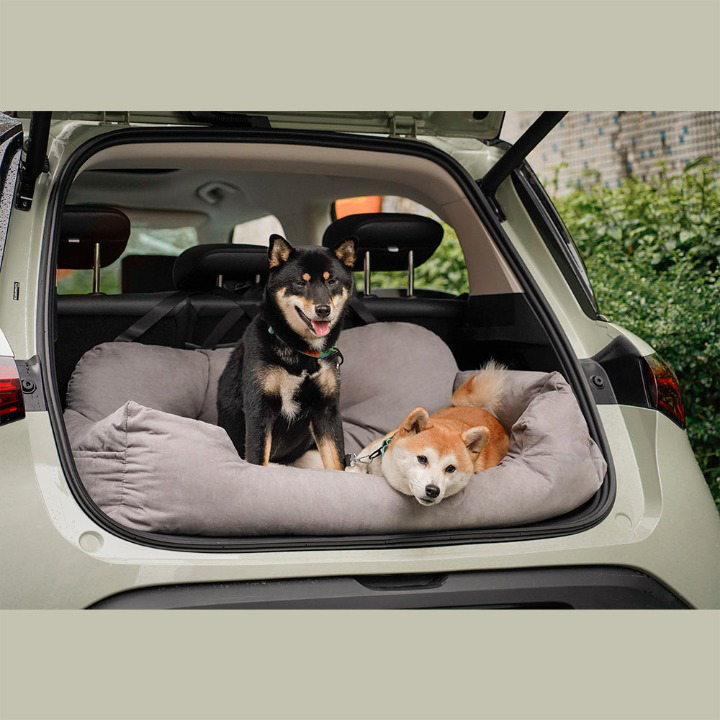 Luxurious PawsRest dog car seat bed for safe, comfortable pet travel. Washable & secure for medium/large dogs.