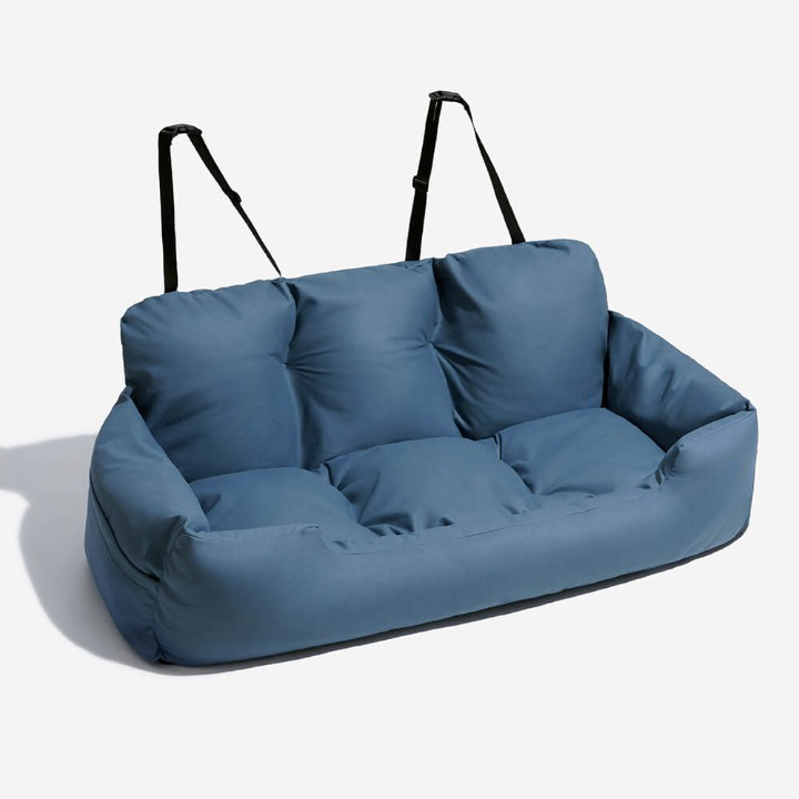 Ultimate comfort dog car seat bed by PawsRest. A luxury, washable pet travel accessory for safe journeys.