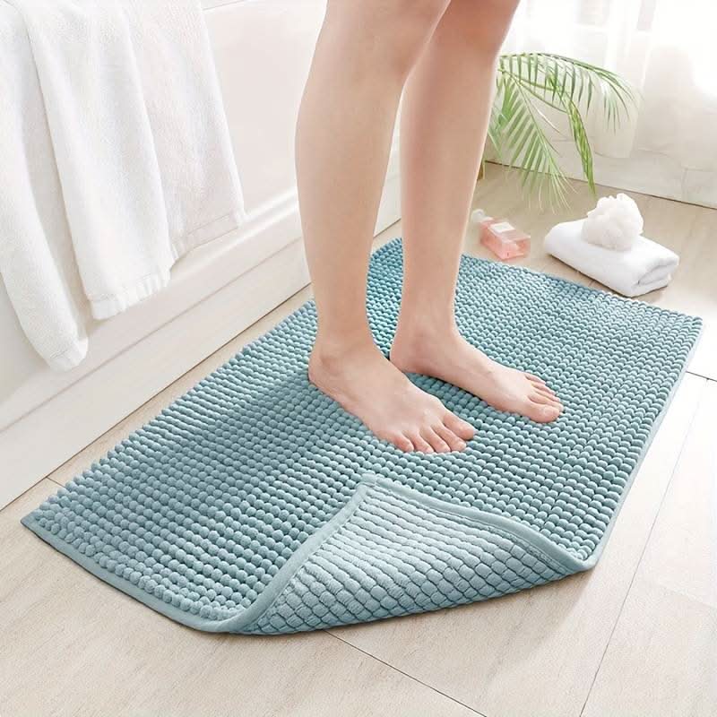 Stylish unisex plush chenille bath rug, a perfect non-slip accent for modern bathroom decor.