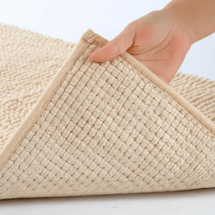 Premium plush chenille bath rug, luxurious underfoot, non-slip and absorbent for ultimate comfort.