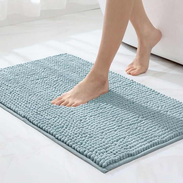 Cozy plush chenille bath rug, non-slip backing provides safety and ultimate comfort after a shower.