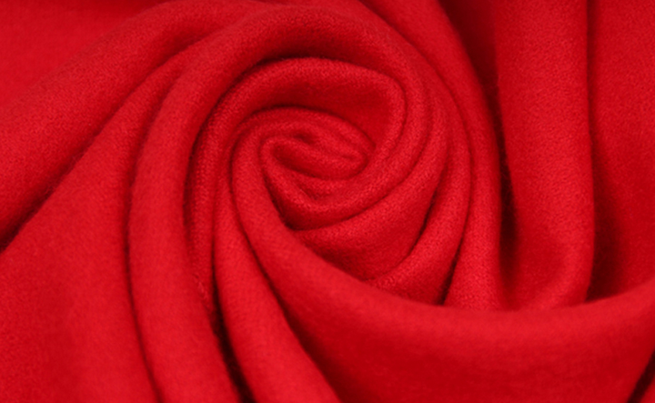 Trendy red unisex cashmere blend scarf, offering warmth and style for any outfit