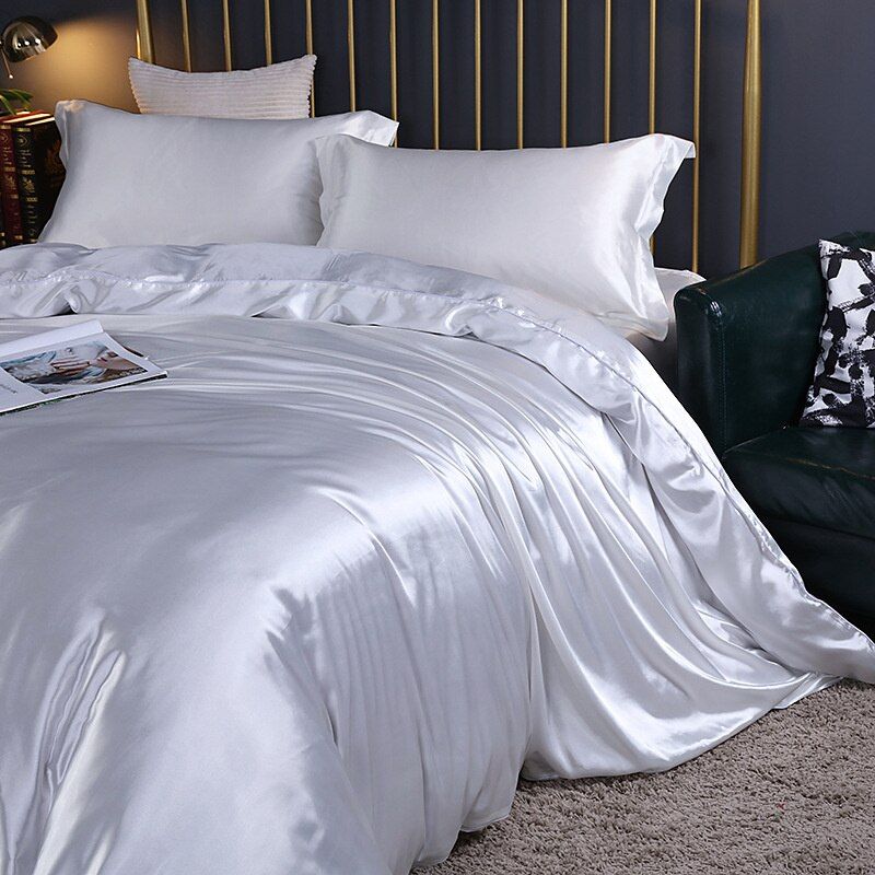 Luxurious Silk-Satin 4-Piece Bedding Set in elegant cream, enhancing sleep comfort