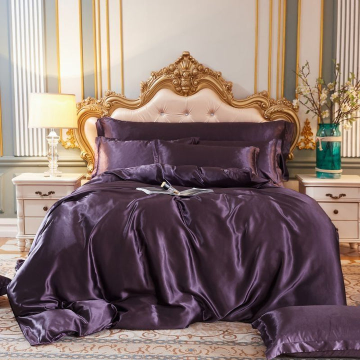 Unisex 4-piece silk-satin bedding set from SilkSleep, combining luxury and sleep comfort