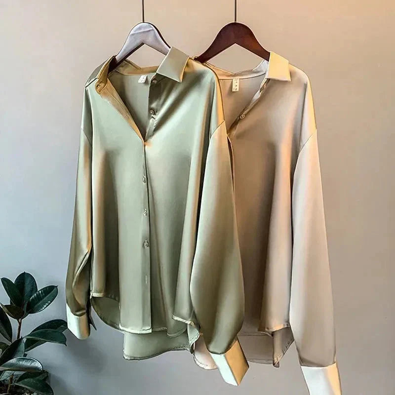 Sophisticated women's fashion blouse made of luxurious silky satin. Elegant versatile top for a stylish look.